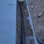 plumber+runs+new+water+line