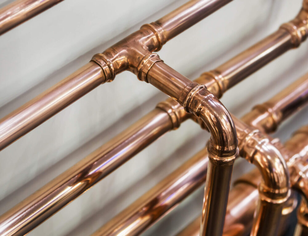 Why does calcium buildup occur in your plumbing pipes, and how to deal